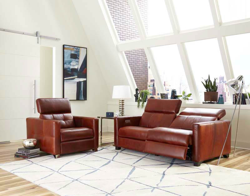 Brown leather loveseat and chair by Hayek's Leather Furniture